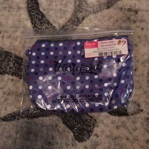 Polka dot mini zipper pouch.